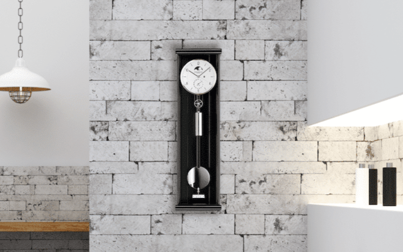 ERWIN SATTLER OPUS PMD 70
Productie in een gelimiteerde productie oplage van 99 stuks.
Zwart gelekte kast met metaal inleg. Kast 70 cm hoog, 20 cm breed en 10 cm diep. U-Vormig, ontspiegeld mineraal glas. Uurwerk Sattler Kaliber 1412. Loopduur 7 dagen. 2 Precisie kogellagers en  7 Robijn lagers. Geanodiseerde wijzerplaat met handbeschilderde maanschijf en datum aanduiding. Geblauwd stalen wijzers. Passage slag op rondgong. 